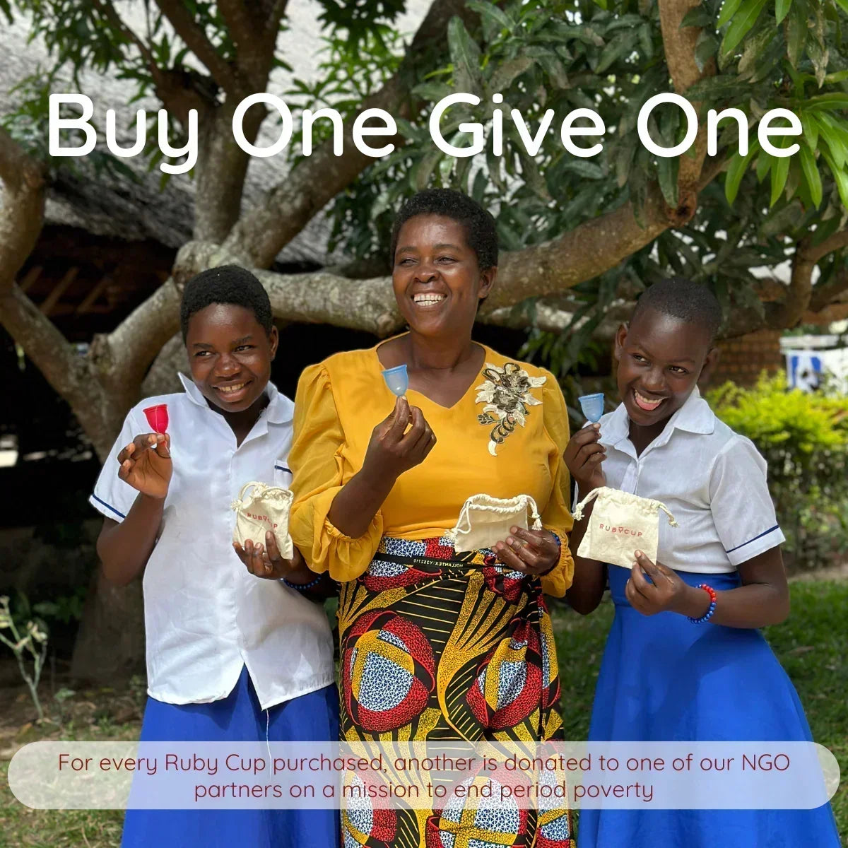 Three people holding a Ruby Cup menstrual cup Buy One Give One Programme