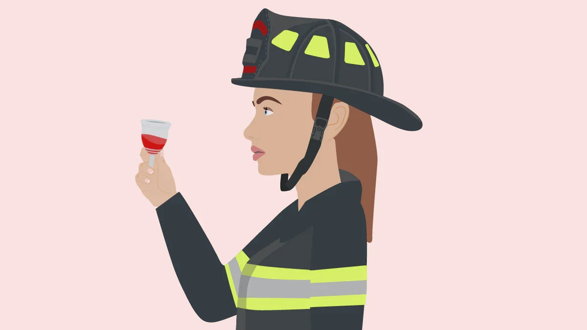 Firefighter holding a Ruby Cup