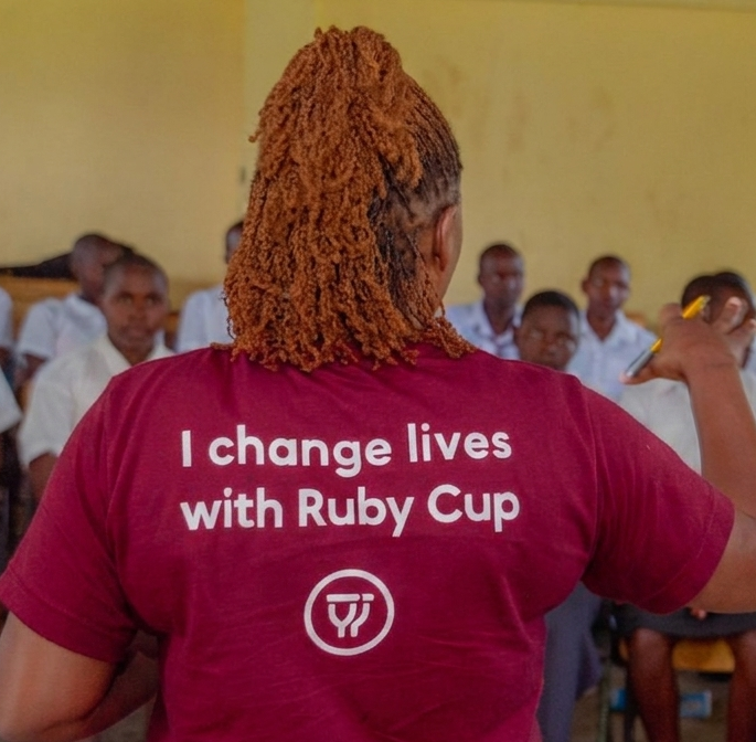 Ruby Cup trainer wearing a t-shirt with the text "I change lives with Ruby Cup"
